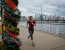 NEWPORT, NJ - DECEMBER 24: A woman jogs along the Hudson River shore on December 24, 2015 in Newport, New Jersey. New York and New Jersey have seen highs in the upper 50s this week, with temperatures expected to reach the low 70s on Christmas Eve. (Photo by Kena Betancur/Getty Images)