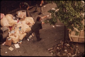 By Miller, Gary, Photographer (NARA record: 8464459) (U.S. National Archives and Records Administration) [Public domain], via Wikimedia Commonshttp://upload.wikimedia.org/wikipedia/commons/0/0d/SANITATION_WORKERS_COLLECT_GARBAGE_ON_172ND_STREET_IN_MANHATTAN_-_NARA_-_549842.jpg